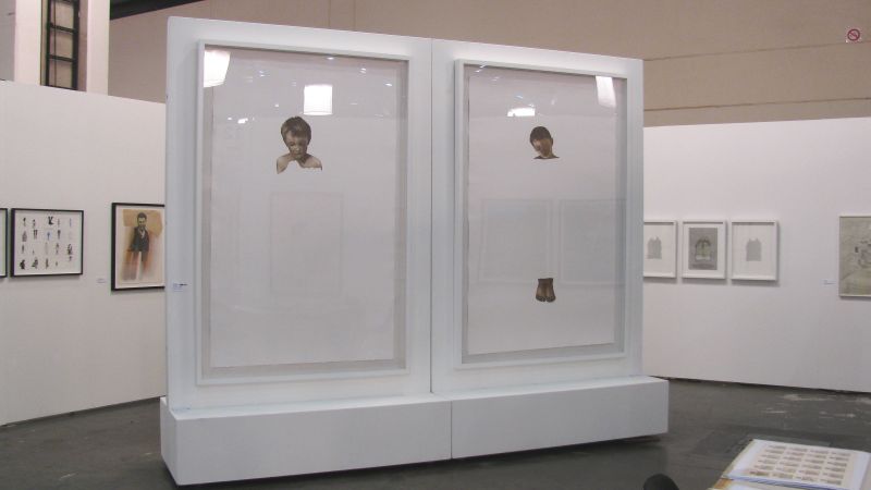Click the image for a view of: Installation view showing two Christine Dixie etchings